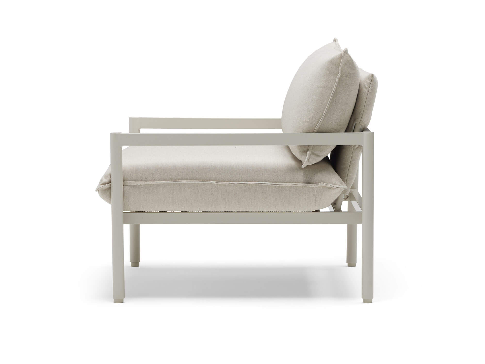 Side view of outdoor chair with white cushions and metal legs